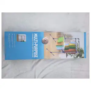 Tendedero multifuncional plegable de acero miniatura 1